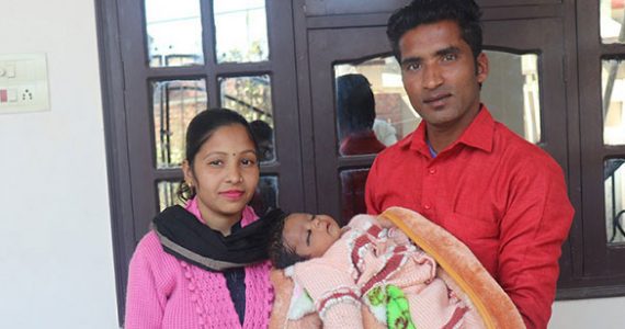Picture of family in India with miracle baby