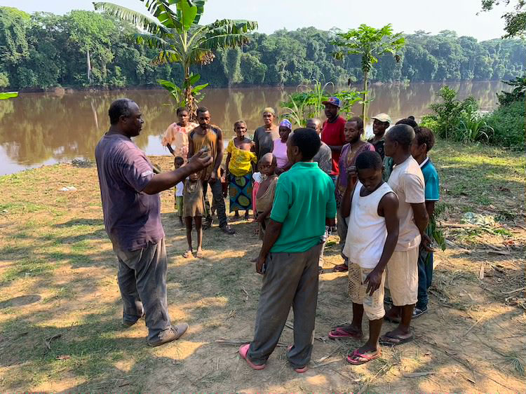Picture of missionary and church planter sharing the gospel in Mpembe, Cameroon