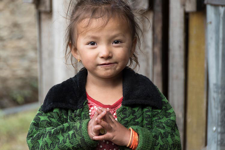 Little girl in Nepali village who was benefitted by our goats for girls project