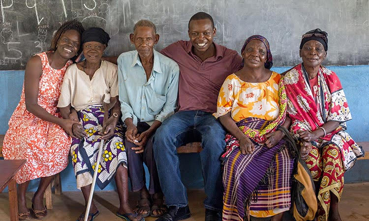 Picture of Peter and Nancy Ochiel with leprosy-afflicted patients
