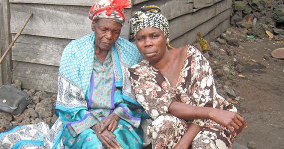 Picture of Monique with leprosy victim in DR Congo