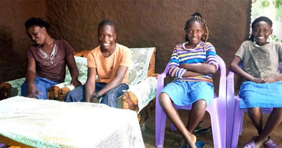 Picture of Kenyan widow and her family in new house