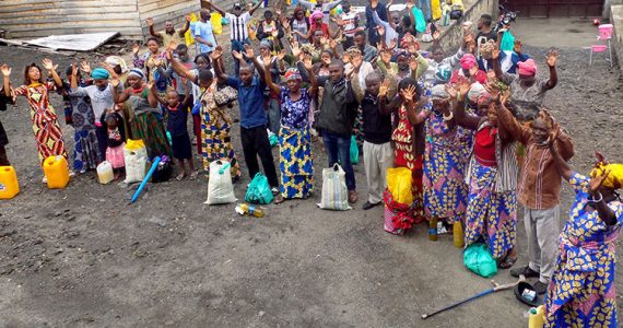 Refugees in DR Congo lifting hands