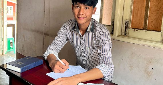 Image of young man in Myanmar receiving discipleship training