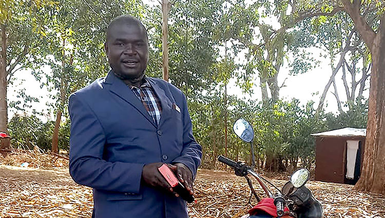 Image of evangelist with motorbike