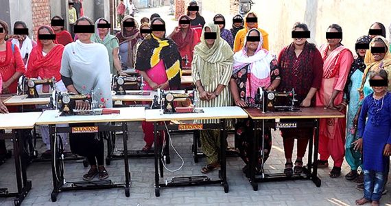 Image of women in India receiving tailoring training