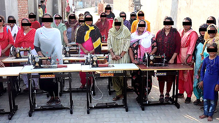Image of women in India receiving tailoring training