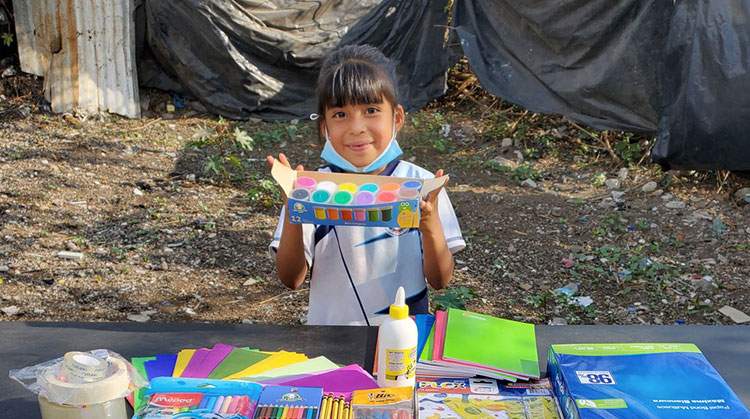 Image of Ceci with school supplies