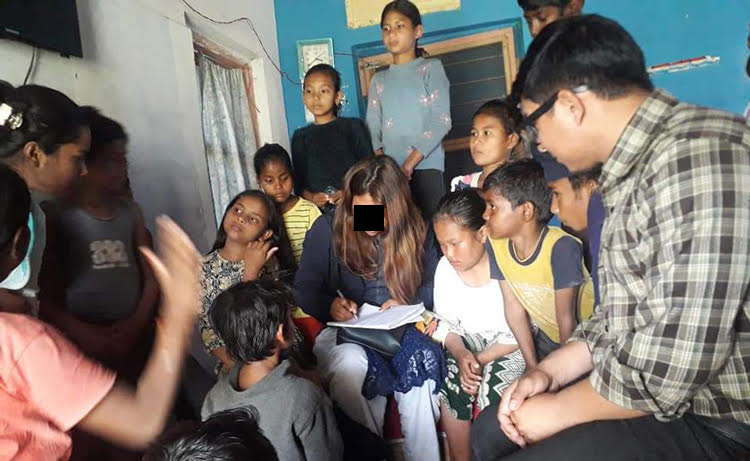 Image of missionary sharing the gospel with deaf students